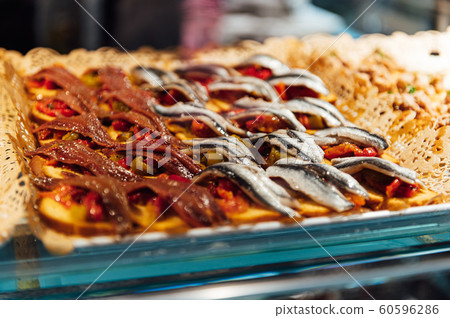 A wide variety of traditional tapas with seafood in Spain at the San Miguel market 60596286