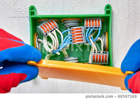 Splicing electrical wires with a clamp terminal. Splicing electrical wires with a clamp terminal. 60597169