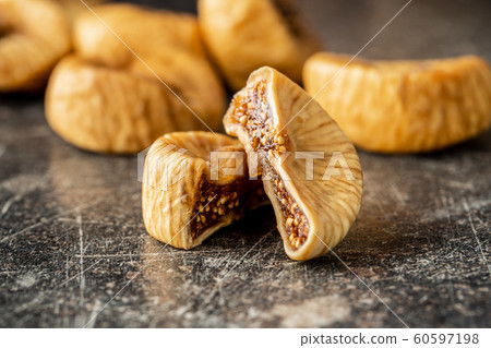 Sweet dried figs. 60597198