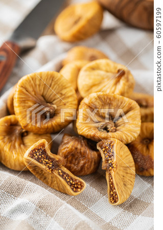 Sweet dried figs. 60597199