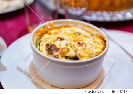 Julienne with mushrooms and cheese close up Julienne with mushrooms and cheese close up 60597474