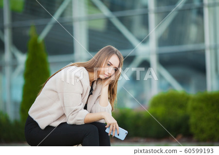 Woman stress. Portrait of bullied girl feeling lonely and worried Woman stress. Portrait of bullied girl feeling lonely and worried 60599193