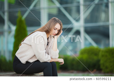 Woman stress. Portrait of bullied girl feeling lonely and worried 60599211