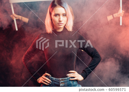 young caucasian girl feminist isolated in smoky space young caucasian girl feminist isolated in smoky space 60599371