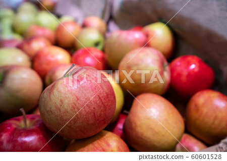Apples pile at the supermarket Apples pile at the supermarket 60601528