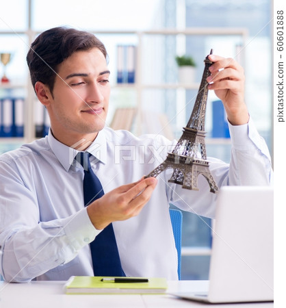 Sales agent working in travel agency Sales agent working in travel agency 60601888