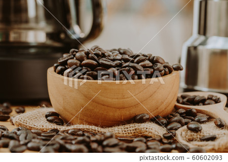 Coffee bean on wooden bowl with home made coffee 60602093