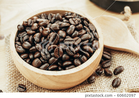 Coffee bean on wooden bowl with home made coffee 60602097