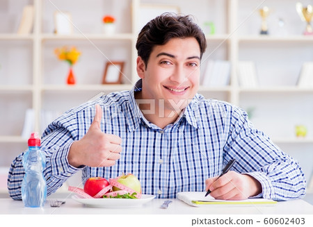 Man on special diet programm to lose weight 60602403
