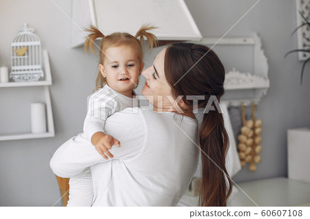 Mother with little daughter having fun at home Mother with little daughter having fun at home 60607108