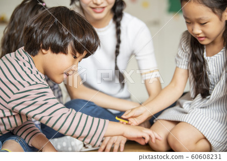 Children nursery school play 60608231