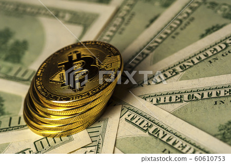 Close-up of a stack of Bitcoin gold coins Close-up of a stack of Bitcoin gold coins 60610753
