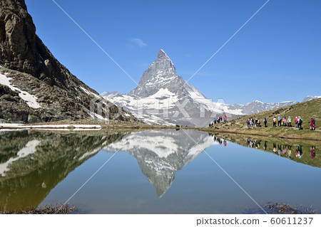 Inverted Matterhorn reflected in Riffel Lake Inverted Matterhorn reflected in Riffel Lake 60611237