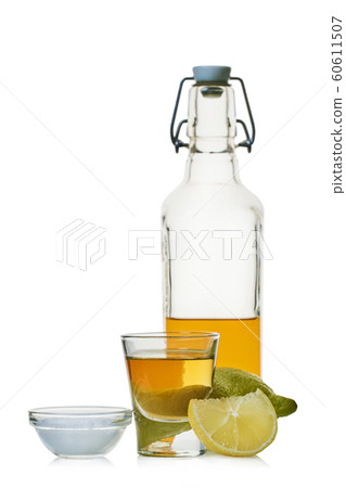 strong alcoholic drink with lemon and salt 60611507