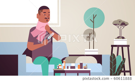 sick man measuring temperature with thermometer unhealthy african american guy in scarf suffering from cold flu virus illness concept modern living room interior flat portrait horizontal sick man measuring temperature with thermometer unhealthy african american guy in scarf suffering from cold flu virus illness concept modern living room interior flat portrait horizontal 60611888