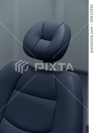 Close-up of an empty office gray armchair Close-up of an empty office gray armchair 60612692