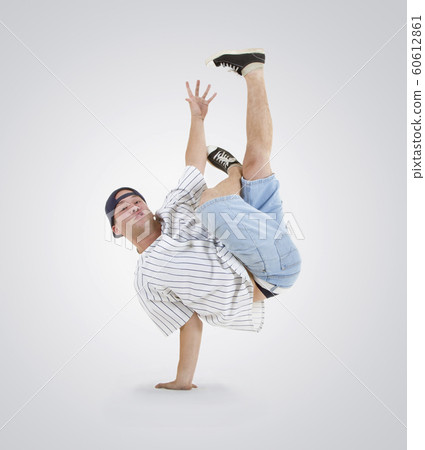 Teenager dancing breakdance in action 60612861