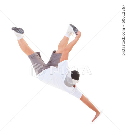 Teenager dancing breakdance in action 60612867