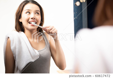 Woman lifestyle toothpaste 60617472