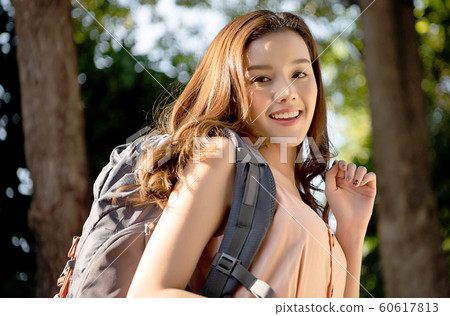 Woman outdoor hiking 60617813