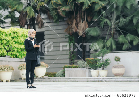 young executive businesswoman in black suit 60621975