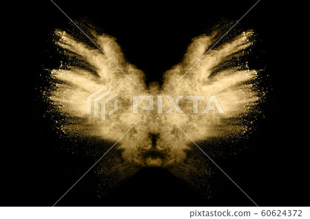 Golden powder explosion on black background. Golden powder explosion on black background. 60624372
