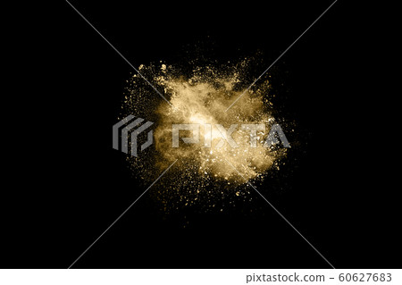 Golden powder explosion on black background. Golden powder explosion on black background. 60627683