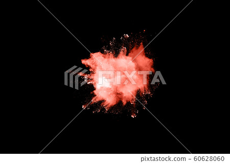 Living Coral  color powder explosion on white background. Colored cloud. Colorful dust explode. Paint Holi. 60628060