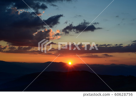 sunset in mountains 60628756