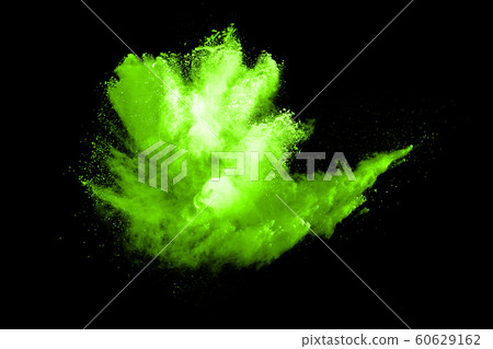 The movement of abstract dust explosion frozen green on black background. Stop the movement of powdered green on black background. Explosive powder green on black background. 60629162
