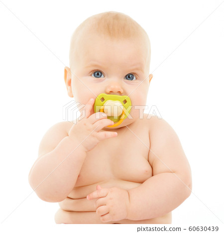 baby girl with pacifier 60630439