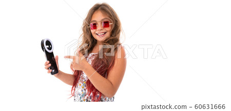 Little pretty caucasian girl do selfie with phone and circle lamp, panorama isolated on white Little pretty caucasian girl do selfie with phone and circle lamp, panorama isolated on white 60631666