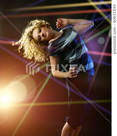 young woman dancing 60631844