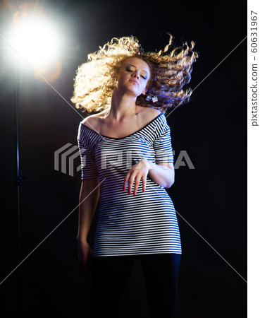 young woman dancing 60631967