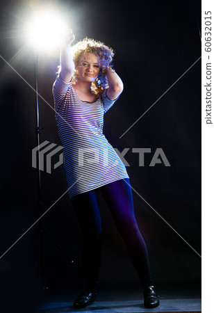 young woman dancing 60632015