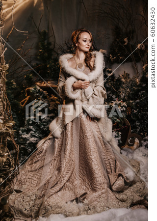 Beautiful girl is waiting for Christmas Beautiful girl is waiting for Christmas 60632430