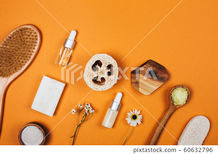 Natural zero waste cosmetics on orange background 60632796
