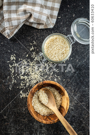 Uncooked indian long rice. 60633410