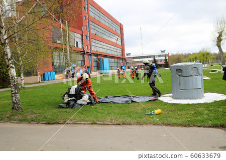 Professional firefighters, rescuers in  60633679