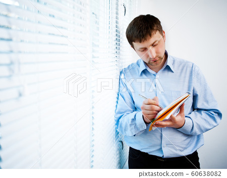 businessman at work businessman at work 60638082
