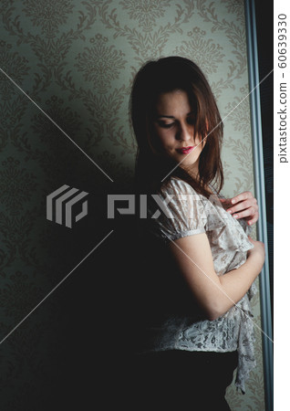 fashion model on a dark background fashion model on a dark background 60639330
