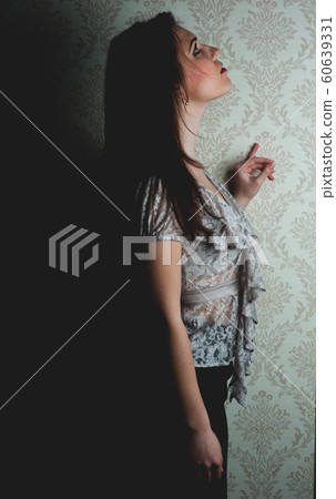 fashion model on a dark background fashion model on a dark background 60639331