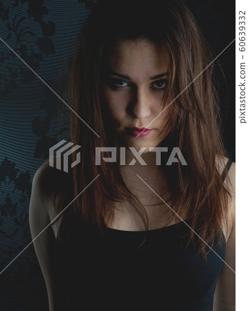 fashion model on a dark background fashion model on a dark background 60639332