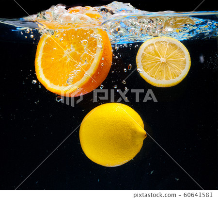 Lemon and orange in the water Lemon and orange in the water 60641581