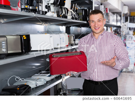 male choosing for new modern toaster male choosing for new modern toaster 60641695