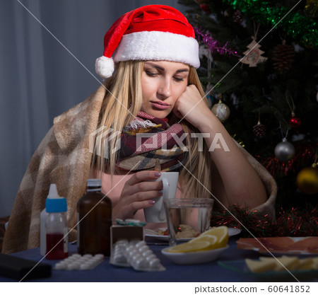 Girl in a plaid is ill of virus in the New Year night 60641852