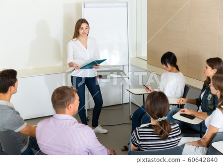 Female manager making presentation Female manager making presentation 60642840