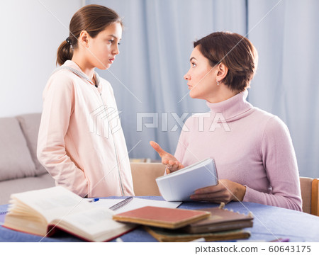 Mother teaches daughter Mother teaches daughter 60643175