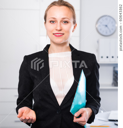 businesswoman working in suit with folder businesswoman working in suit with folder 60643862