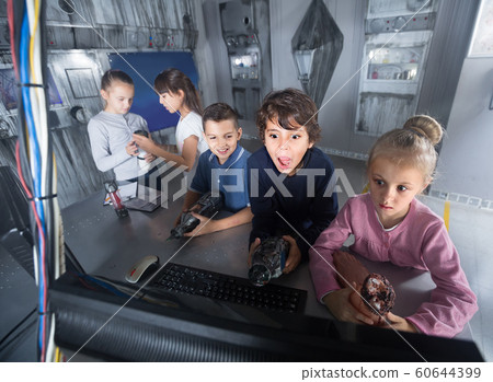 children play in the quest room of a inscrutable bunker 60644399